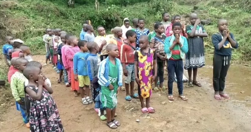 Children studying outdoors in Balu, Cameroon